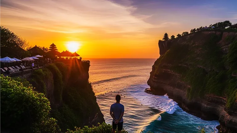 sunset view from uluwatu cliff with temple silhouette and ocean waves what to see in uluwatu